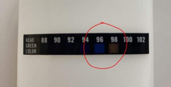 temperature strip on urine bottle